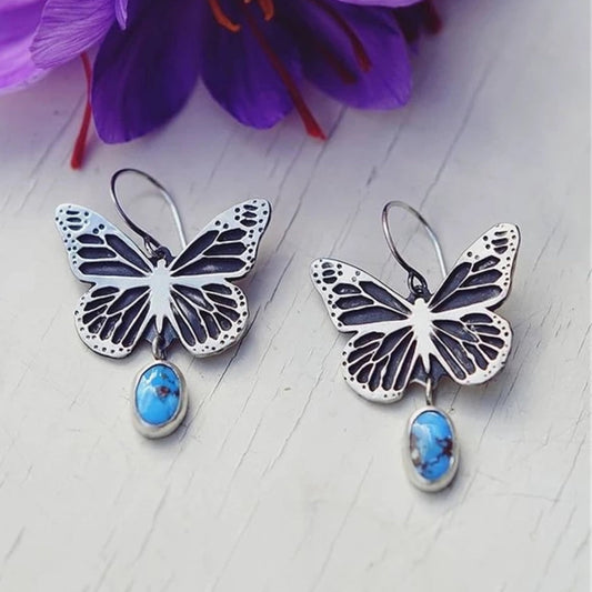 SORELLEI – Vintage-Schmetterlingsohrringe aus Silber mit blauem Stein