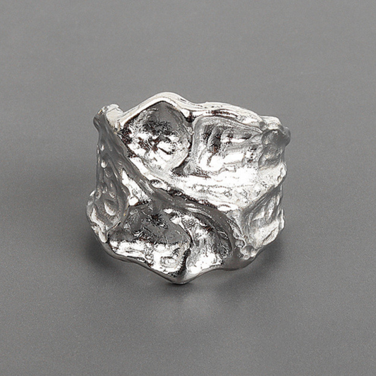 Asymmetrical wide ring