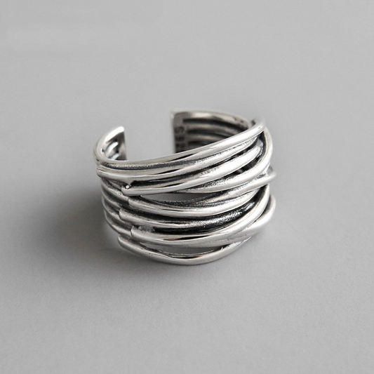 Adjustable wide ring with modernist design