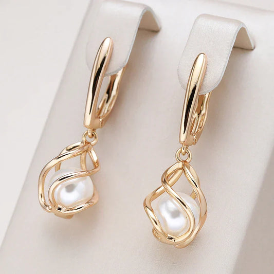 Elegante Perlenohrringe in Gold