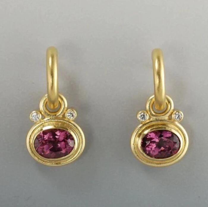 Vergoldete Vintage-Ohrringe mit blauem Zirkonia-Inlay