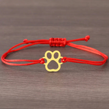 ELINE – Elegantes verstellbares Pfotenarmband mit schwarzer und roter Kordel für stilvollen Ausdruck
