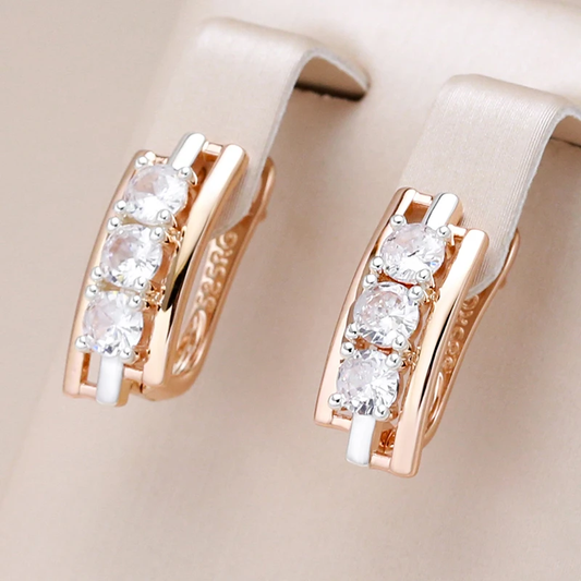Ohrringe mit in Gold eingefassten Kristallen